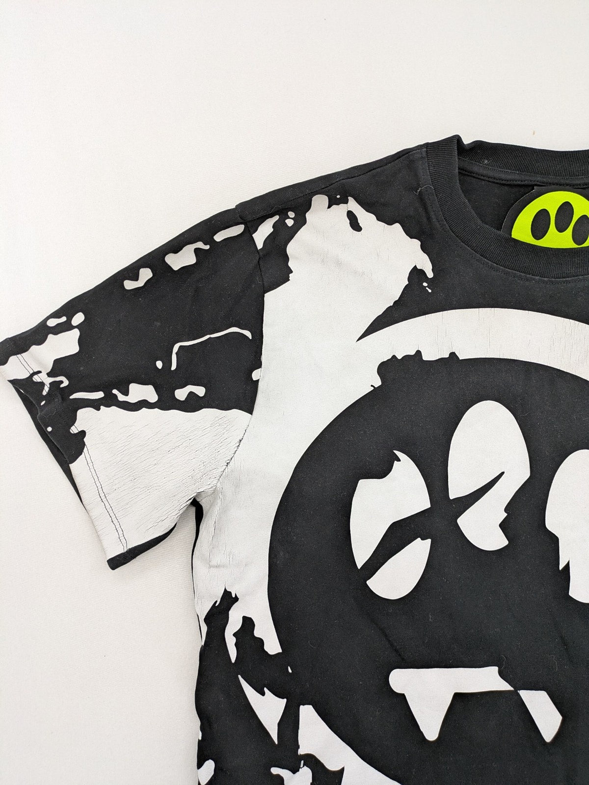 Barrow grey t-shirt with large black and white smiley graphic print and logo patch.