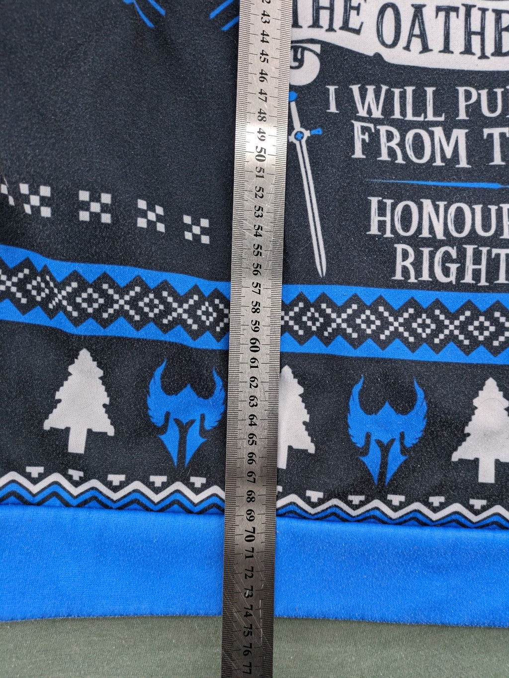 Dungeons & Dragons blue sweatshirt featuring Paladin text, iconic logo, and fantasy graphics.