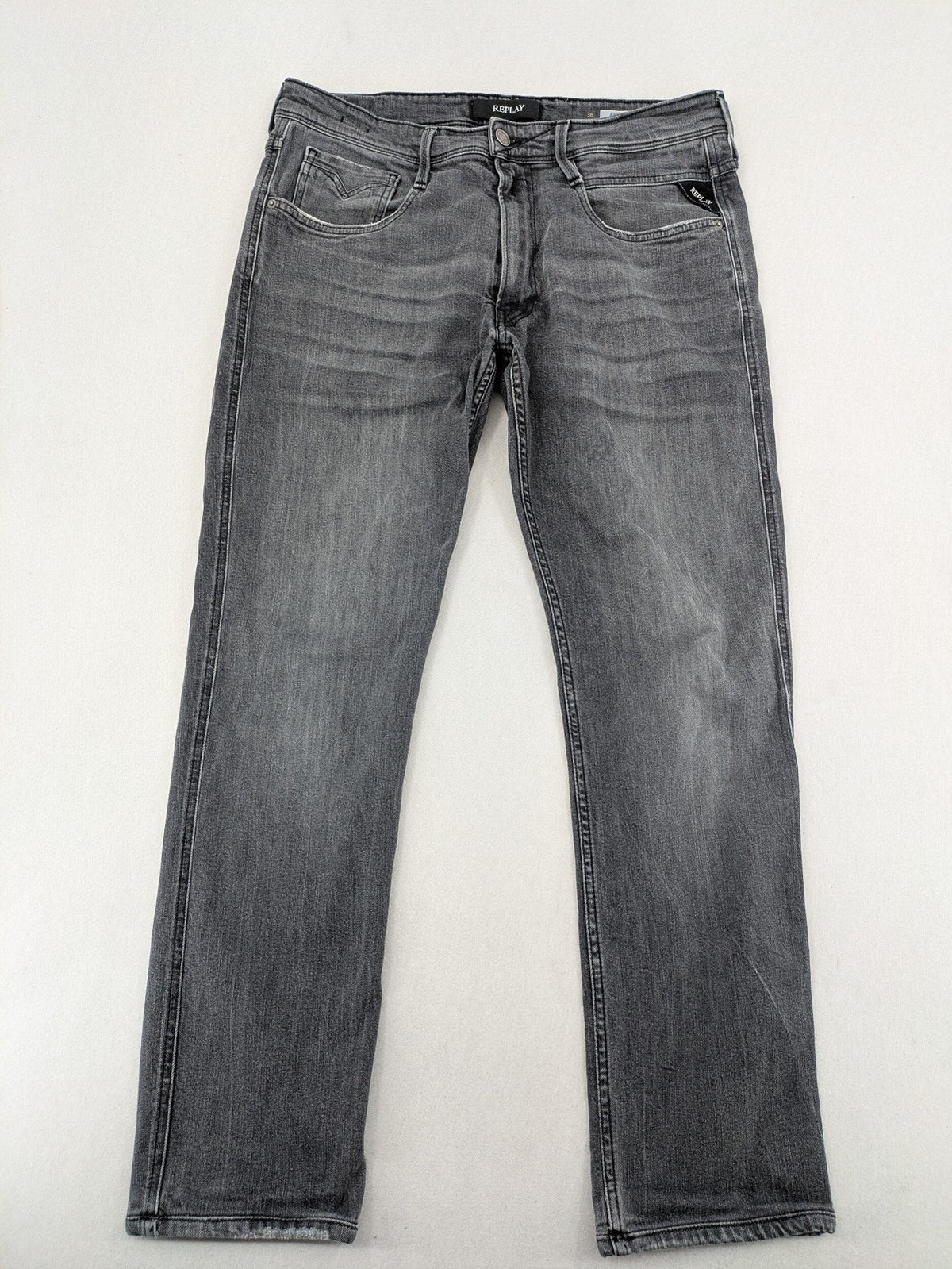 Replay grey straight jeans faded wash five-pocket style with logo on pocket.