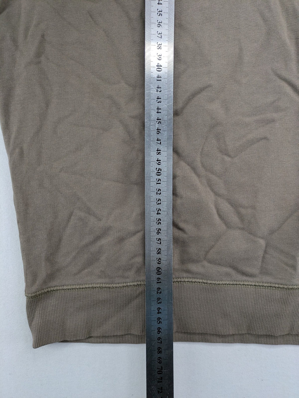 Tony Brown brown turtle neck jumper with embroidered logo and zip button placket.