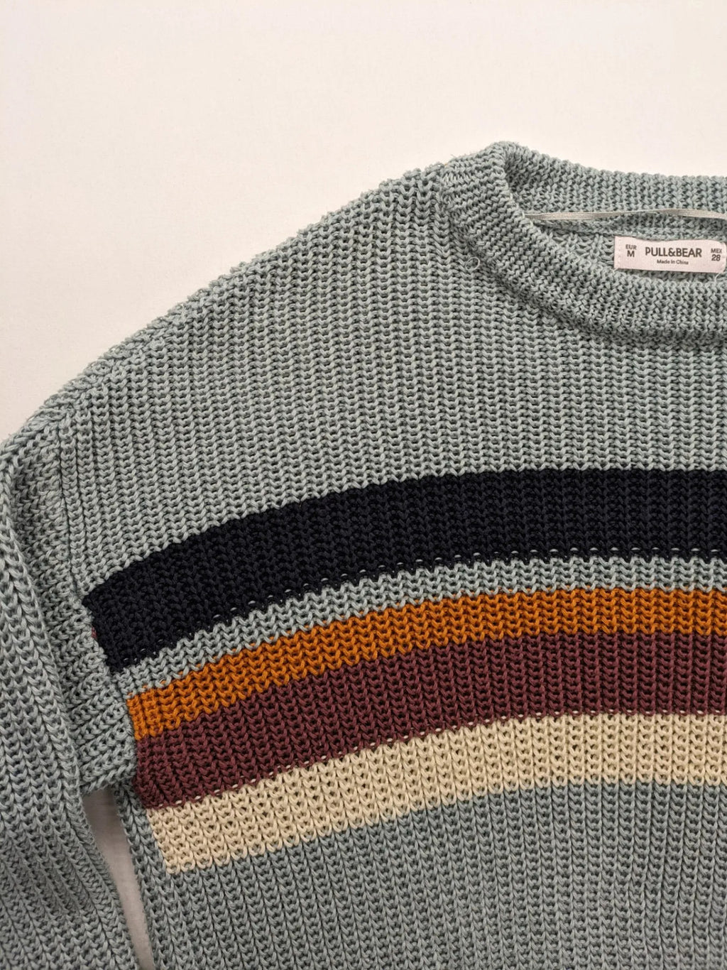 Pull&Bear beige turtle neck jumper with block stripe pattern and ribbed knit texture.