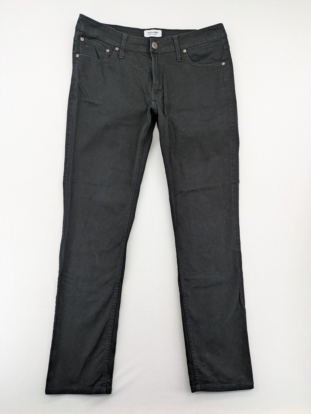Jack & Jones black slim fit jeans with logo patch and cotton-stretch blend.