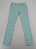 Dito green treggings with pull-on design, front pockets, and belt loops.