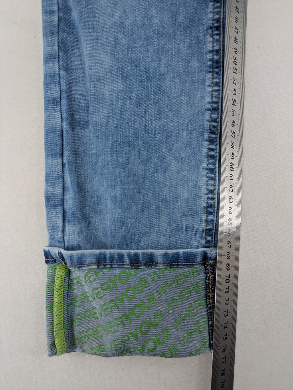 Street One blue straight jeans with green patterned cuffs and button fly detail.
