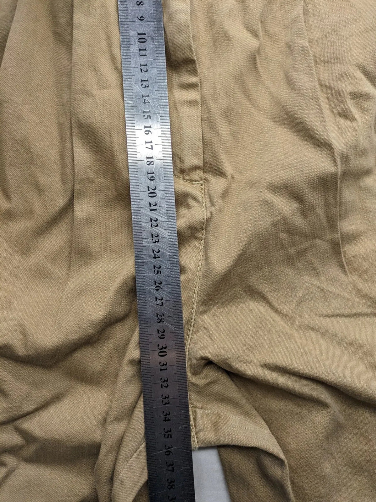 H&M beige tapered leg pants with pleats, high waist, 100% cotton, side pockets.