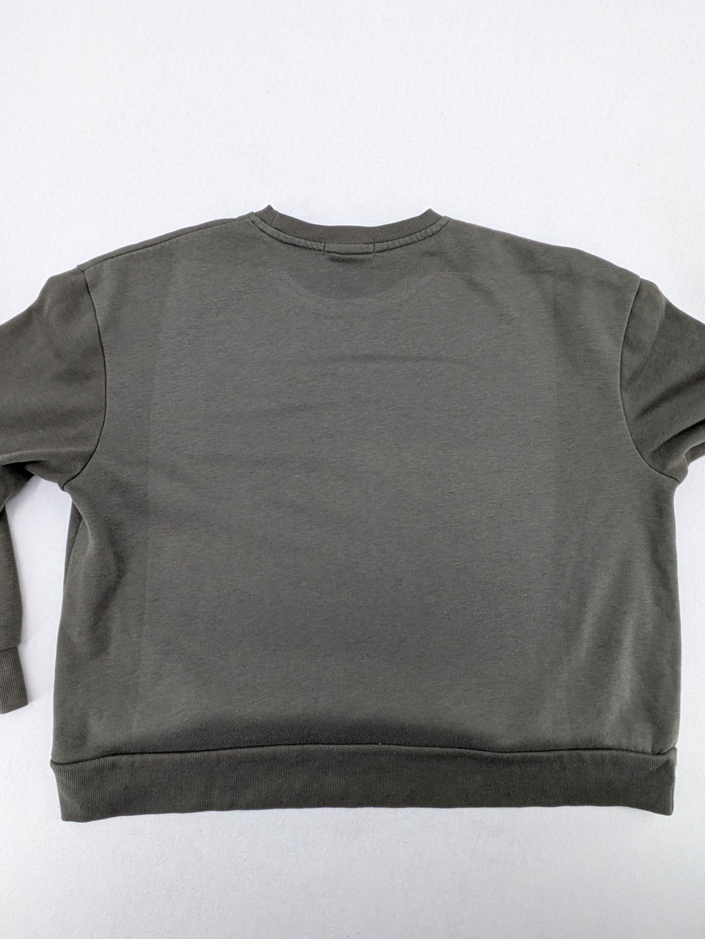 Dragon Ball Z blue sweatshirt featuring Son-Goku graphic and Primark logo.