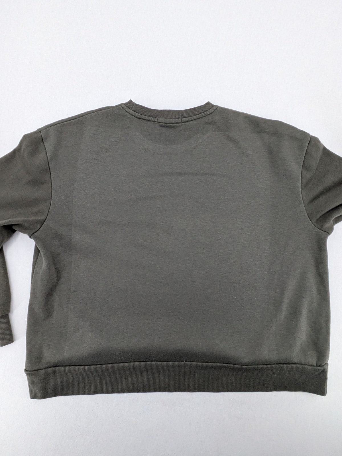 Dragon Ball Z blue sweatshirt featuring Son-Goku graphic and Primark logo.