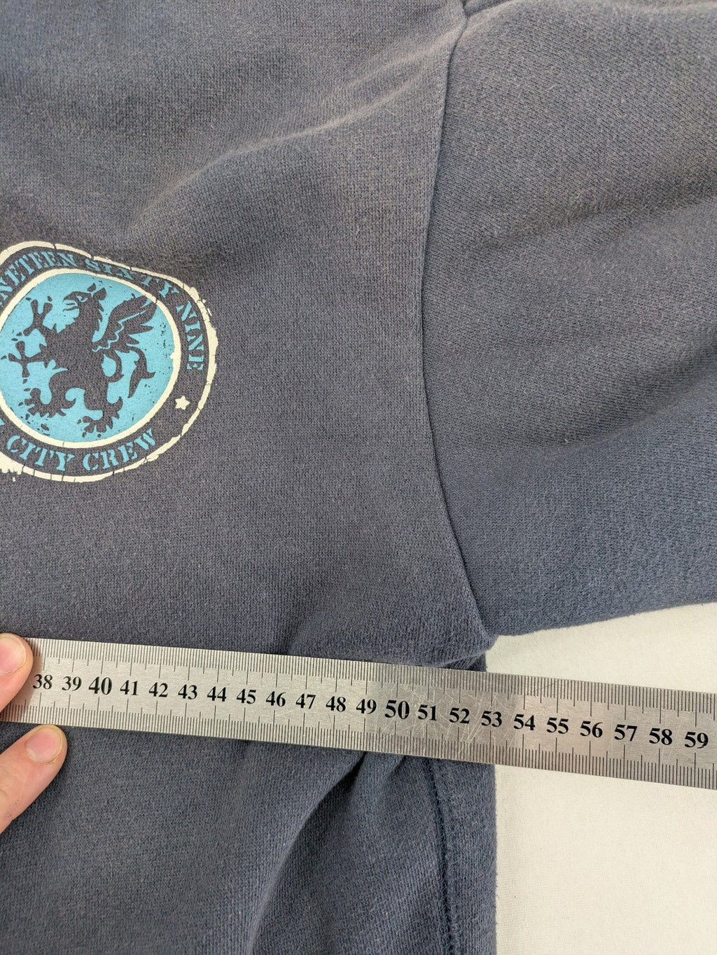 Gap Kids blue and grey zip-up hoodie with "All City Crew" logo and Sherpa lining.