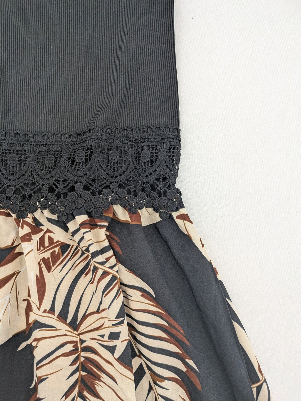 Kontrast summer dress beige tropical leaf print with black ribbed tank top and lace trim.
