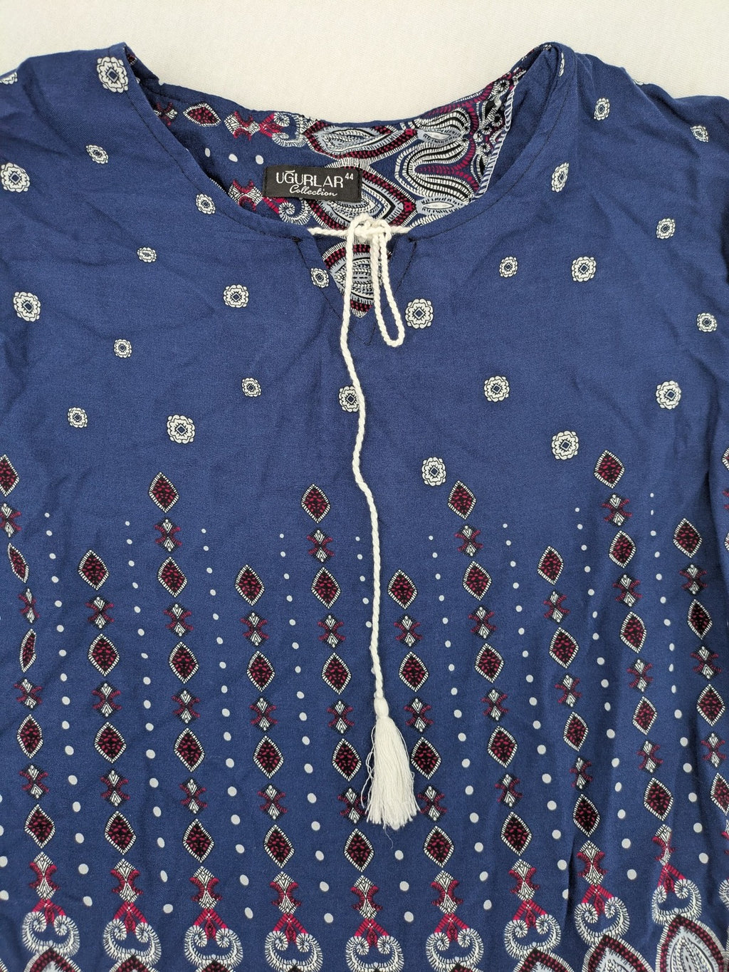 Uğurlar Collection multi tunic dress with vibrant Boho-Ethno pattern and V-neck tassel detail.