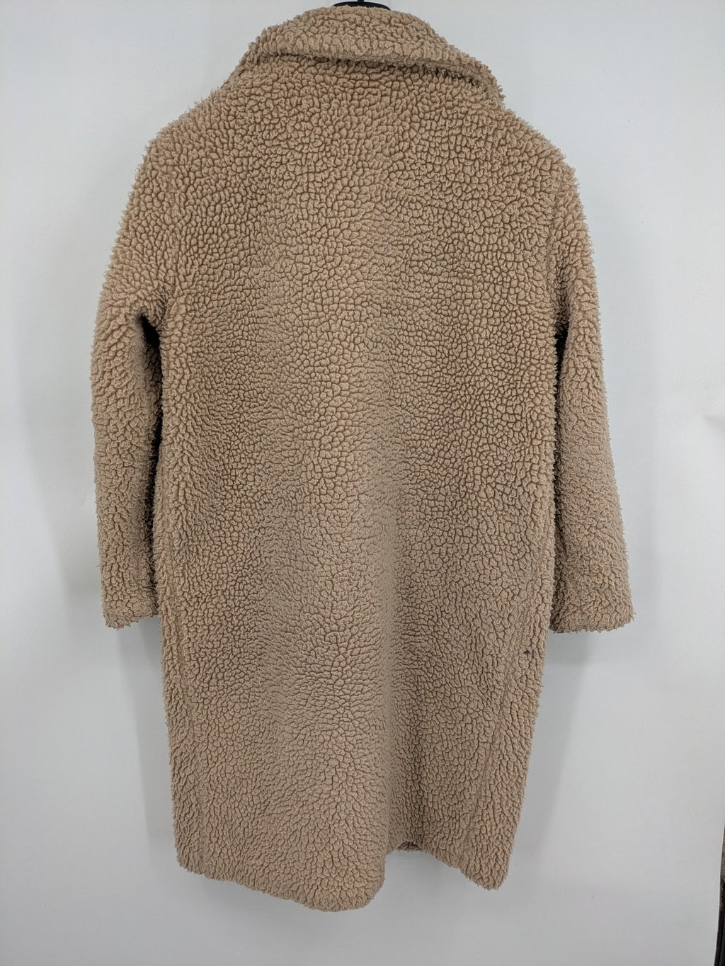 Clockhouse beige teddy coat longline design soft faux fur material with notched collar.