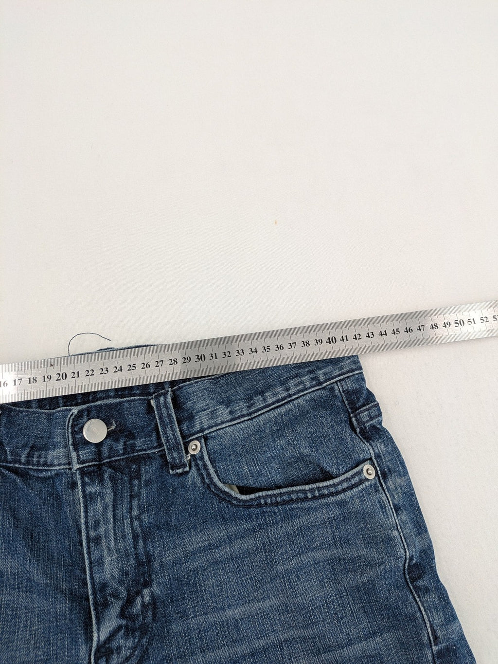 Trussardi blue straight jeans with classic 5-pocket design and durable denim material.