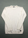 Haskalkan white turtle neck jumper with geometric textured pattern and ribbed cuffs.