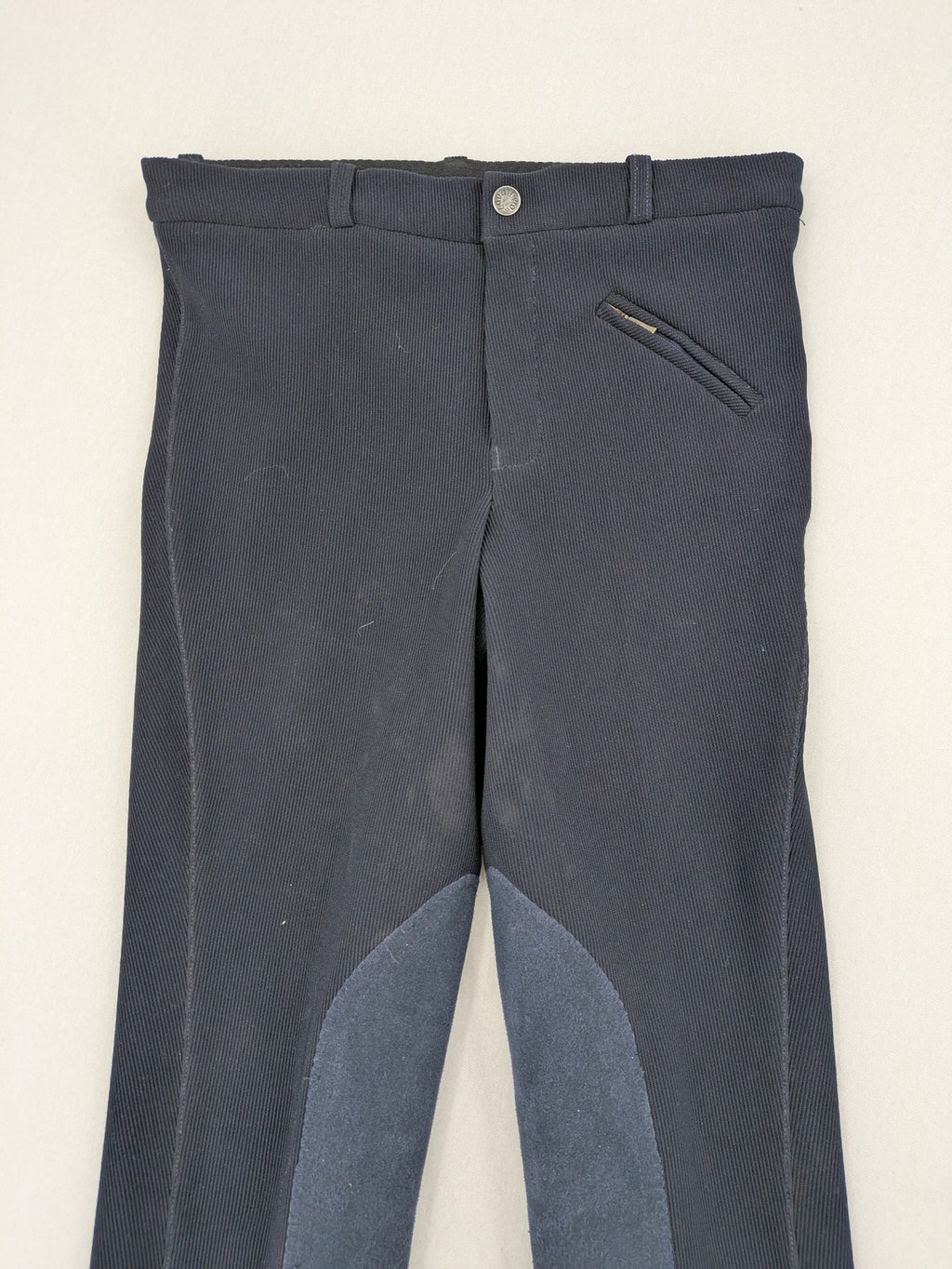 Cavalliero blue youth riding pants with knee patches and ribbed microfiber fabric.