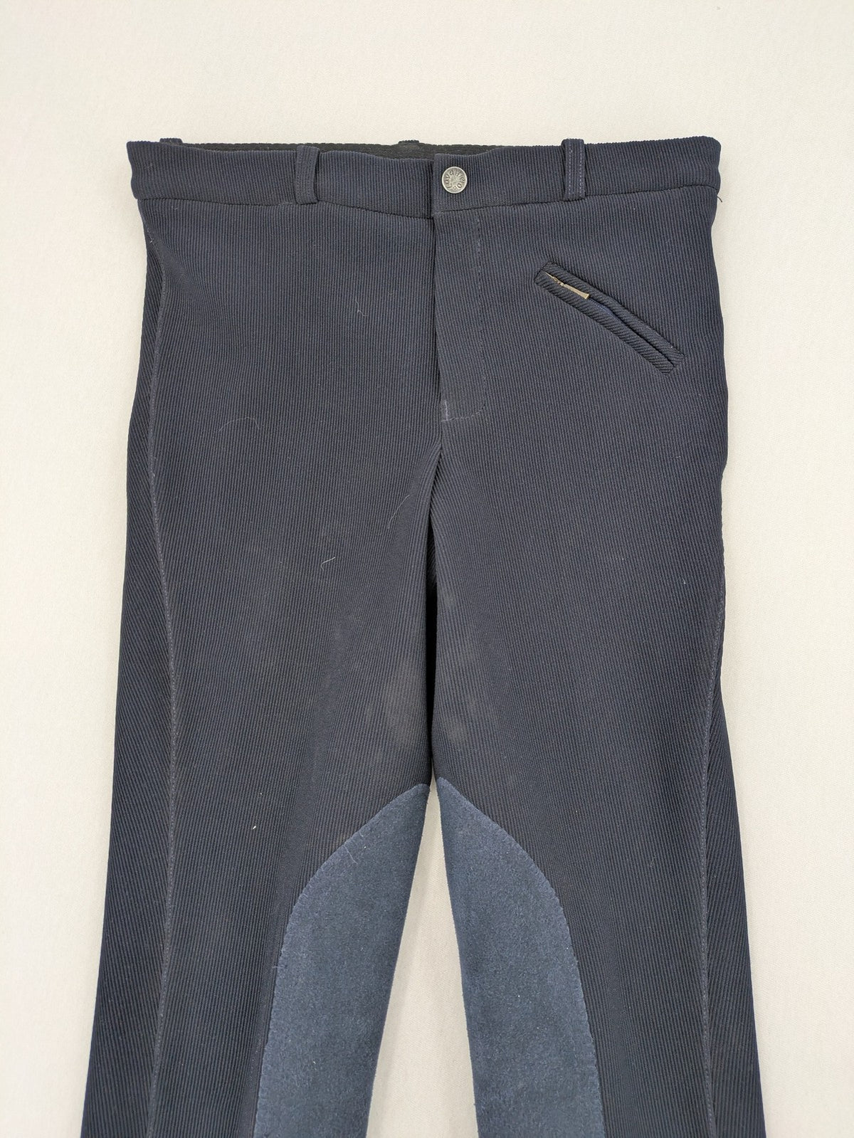 Cavalliero blue youth riding pants with knee patches and ribbed microfiber fabric.