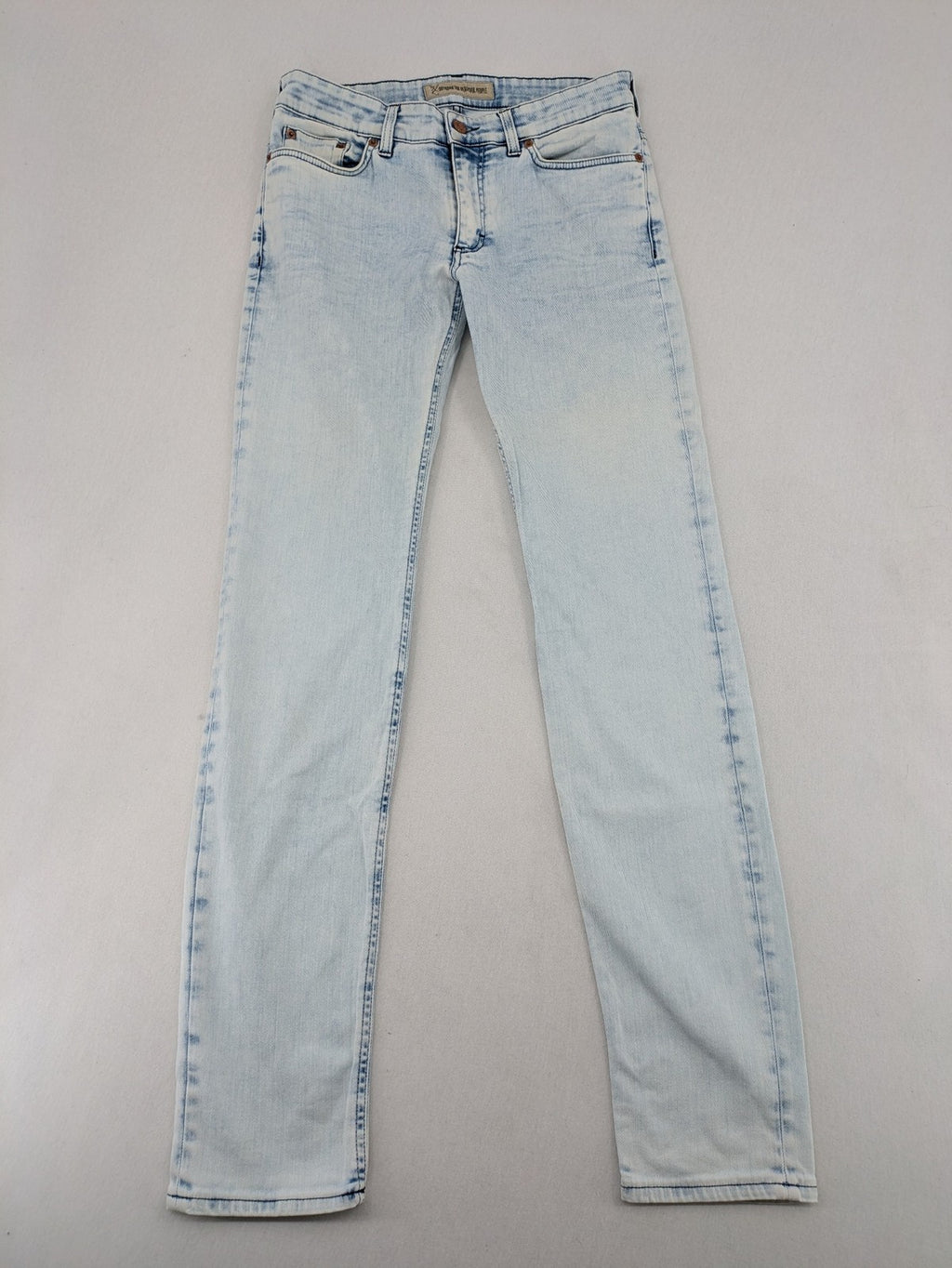 Drykorn blue slim fit jeans with acid wash and leather logo patch.