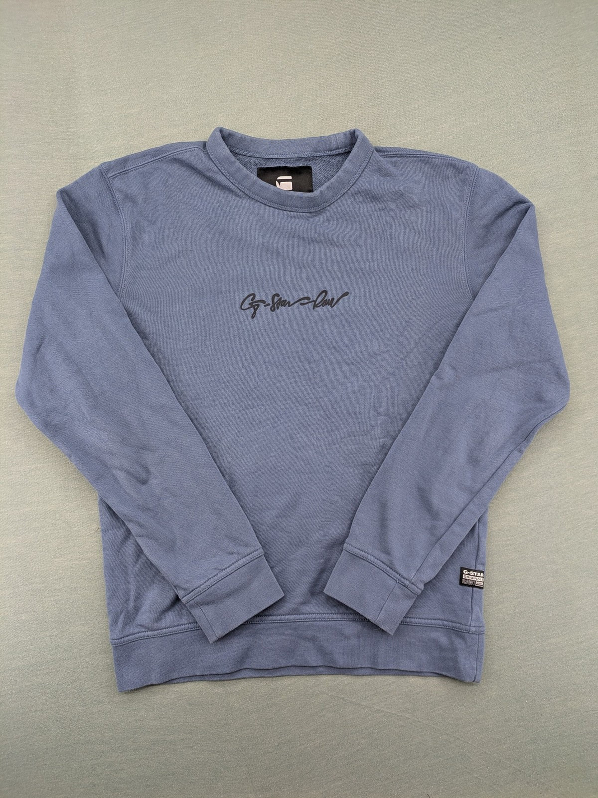 G-Star Raw blue turtle neck jumper with subtle logo on chest, made from organic cotton blend.