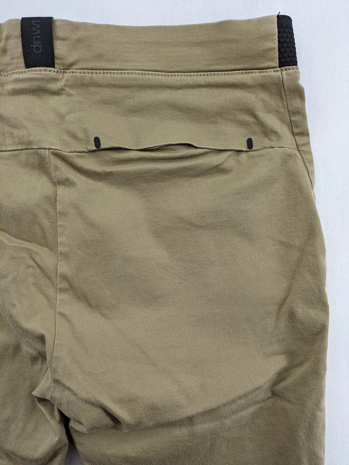 Zara khaki pants with elastic waistband, made from stretch cotton blend for comfort.