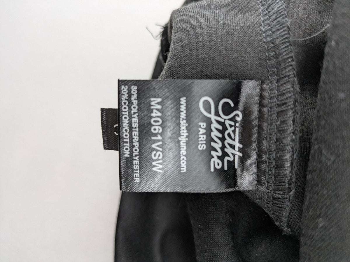 Sixth June black sweatshirt with Gothic "Propaganda" graphic print and logo details.