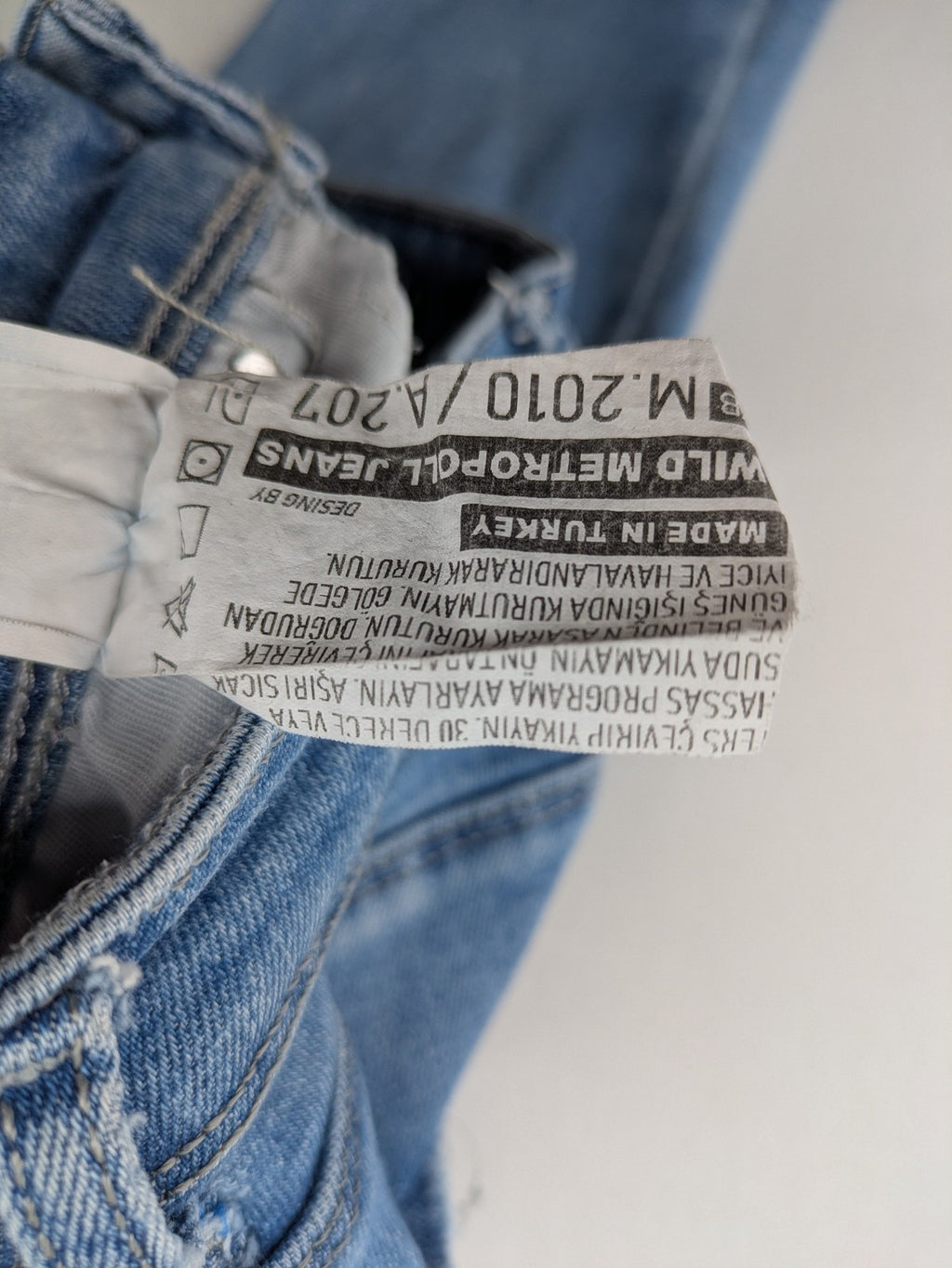 Metropoll blue high waist skinny jeans with frayed hem and classic 5-pocket design.