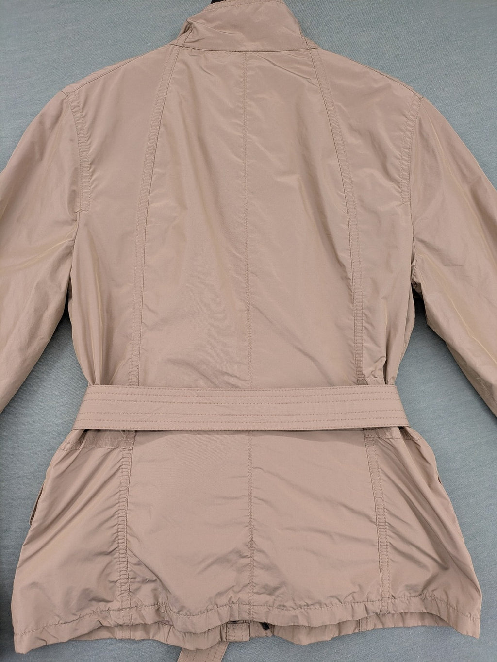 MORE & MORE beige field jacket with belt, four pockets, and standing collar.