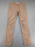 Fjällräven beige pants regular fit durable fabric outdoor style with logo detail.