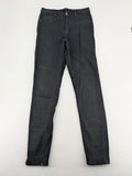Ginatricot black skinny fit jeans with classic 5-pocket design and button closure.