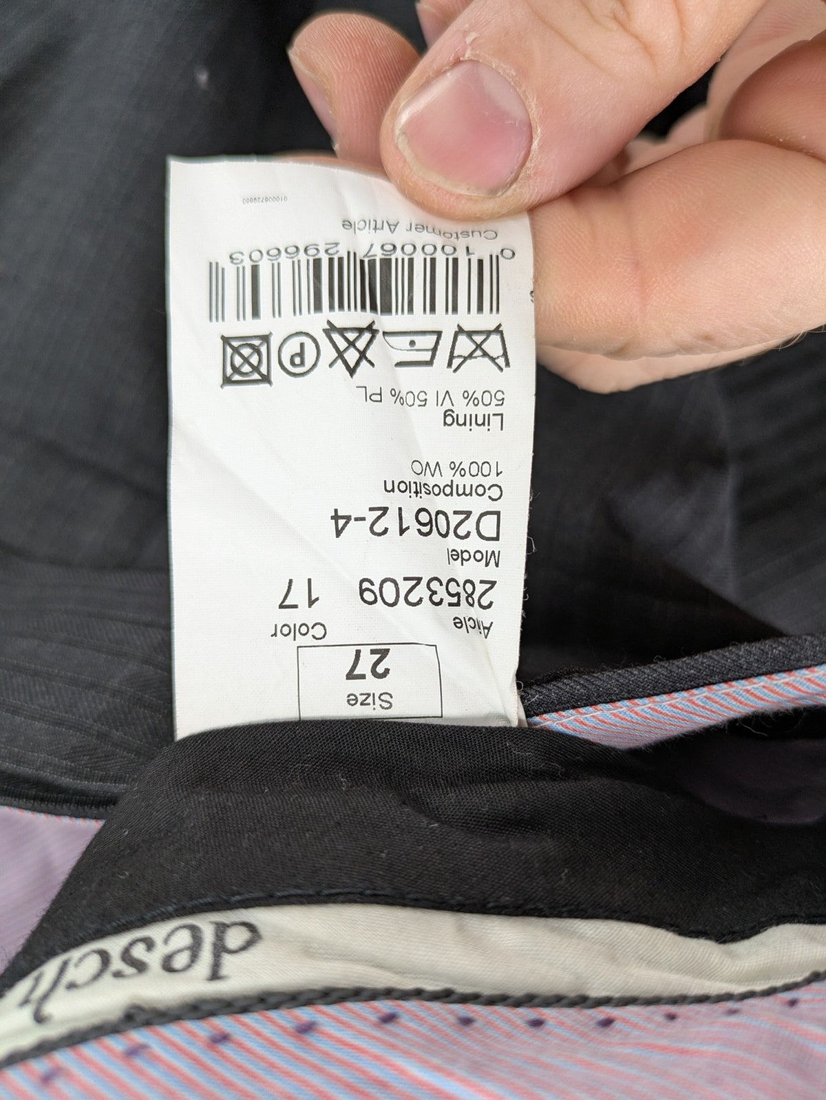 Desch grey suit pants with subtle pinstripe pattern and flat front design.