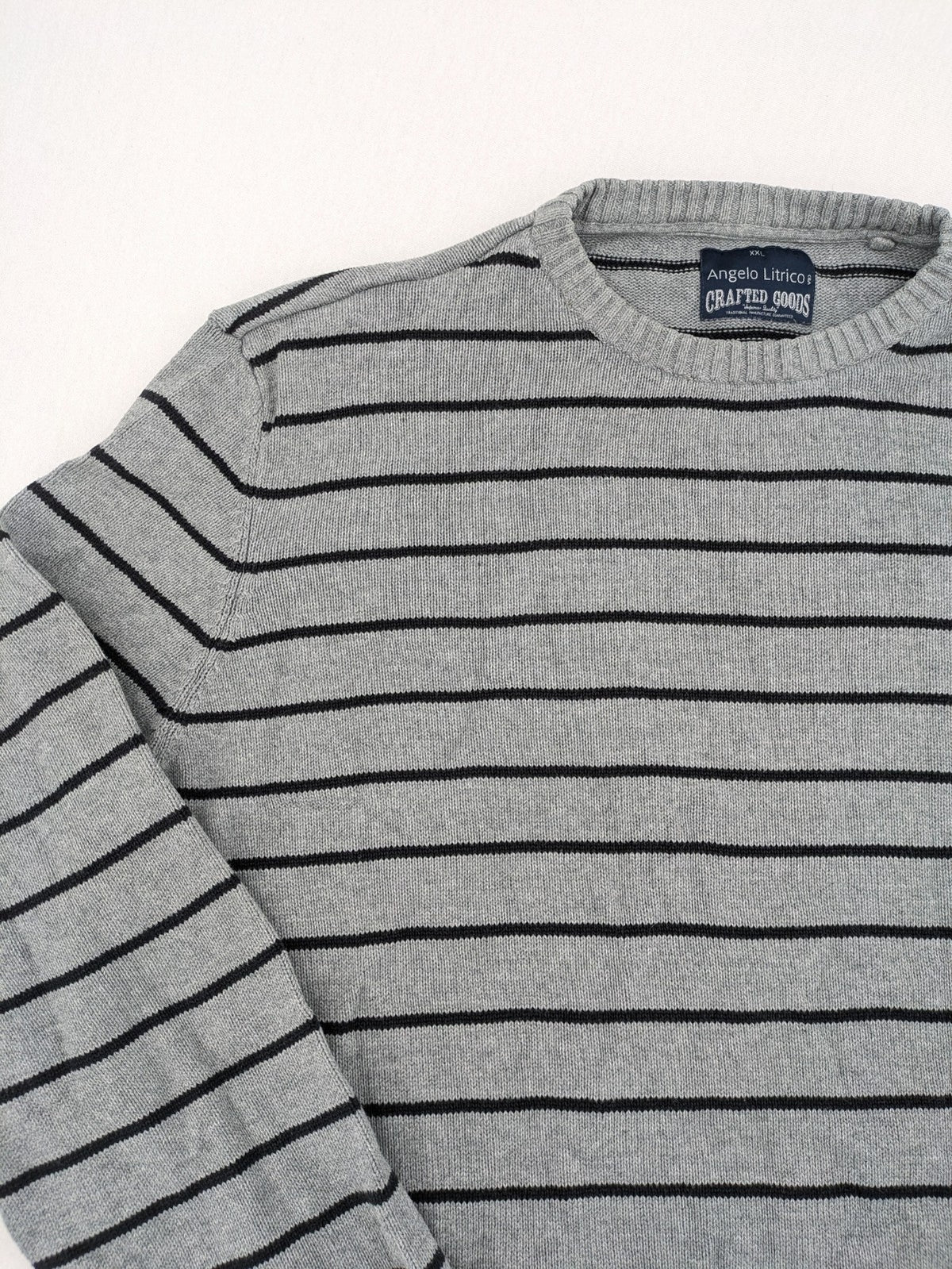 Angelo Litrico grey and black striped knit jumper, round neck, soft material.