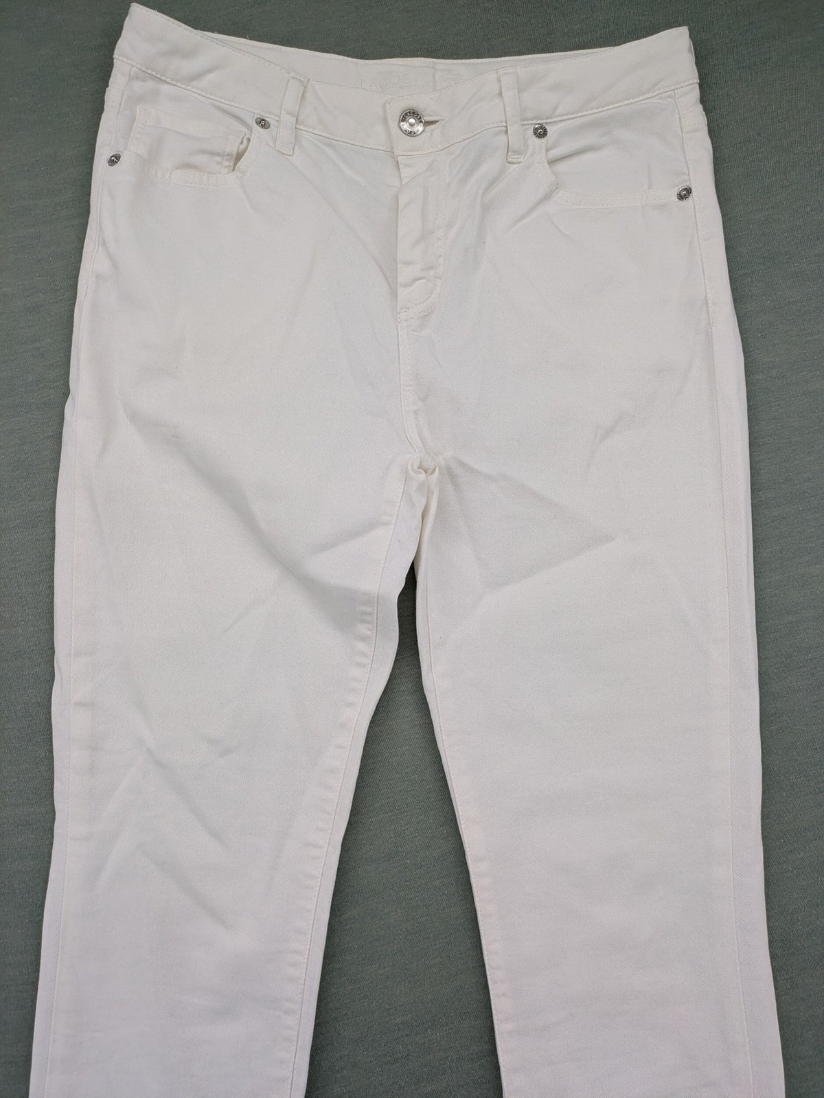 Lacoste white straight jeans high rise slim fit with logo and stretch denim material.