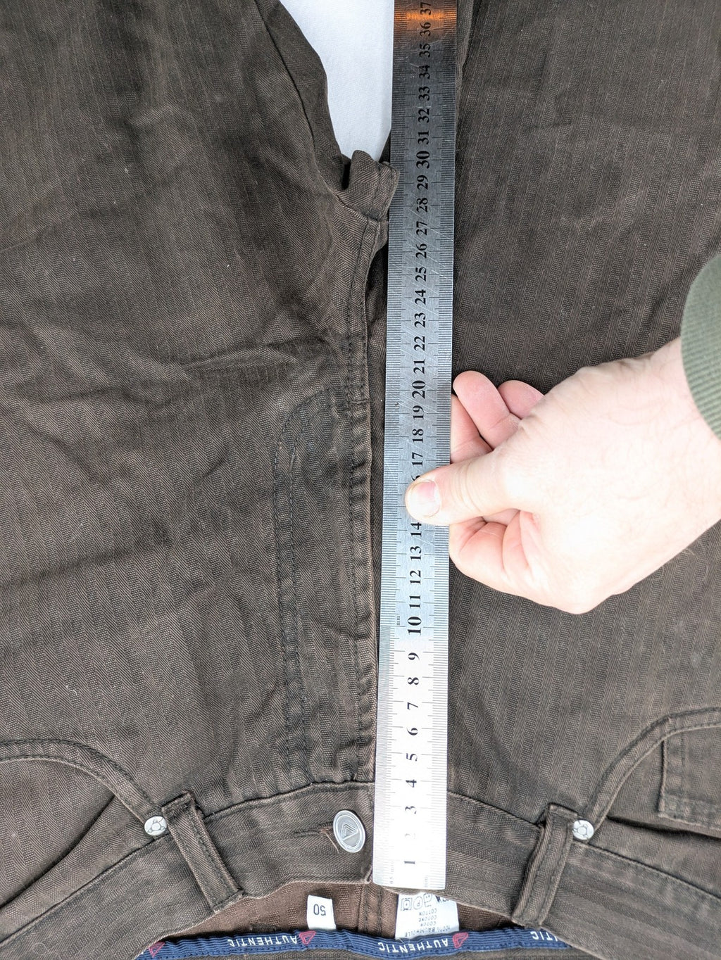Authentic Clothing Company brown straight jeans with subtle stripe pattern and brand patch.