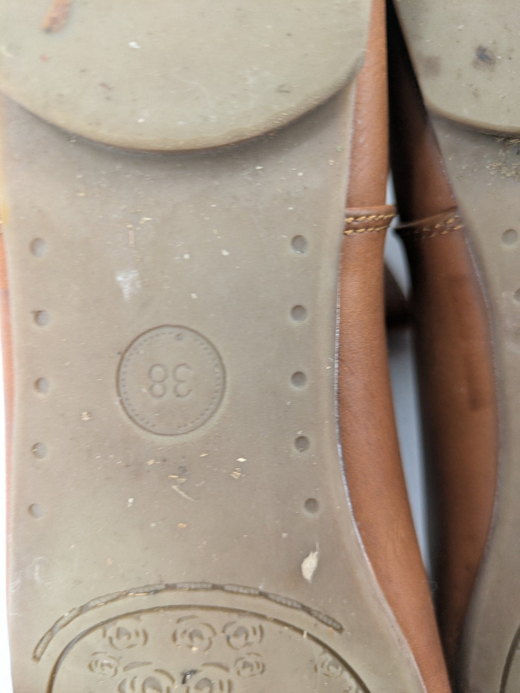 Van Hill brown ankle boots with slouchy design, fold-over cuff, and soft lining.