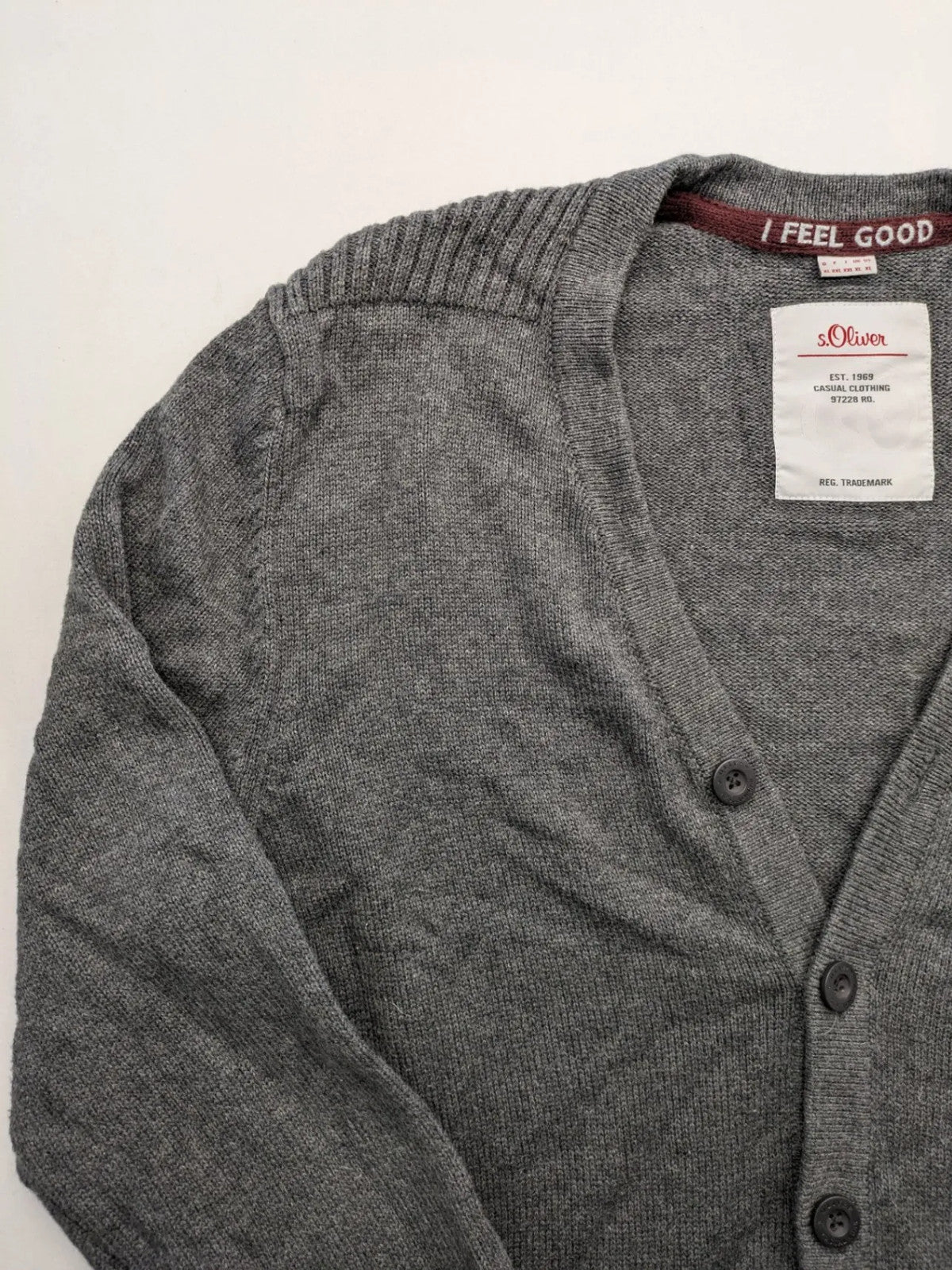 s.Oliver grey turtle neck jumper with varsity college patch and button closure.