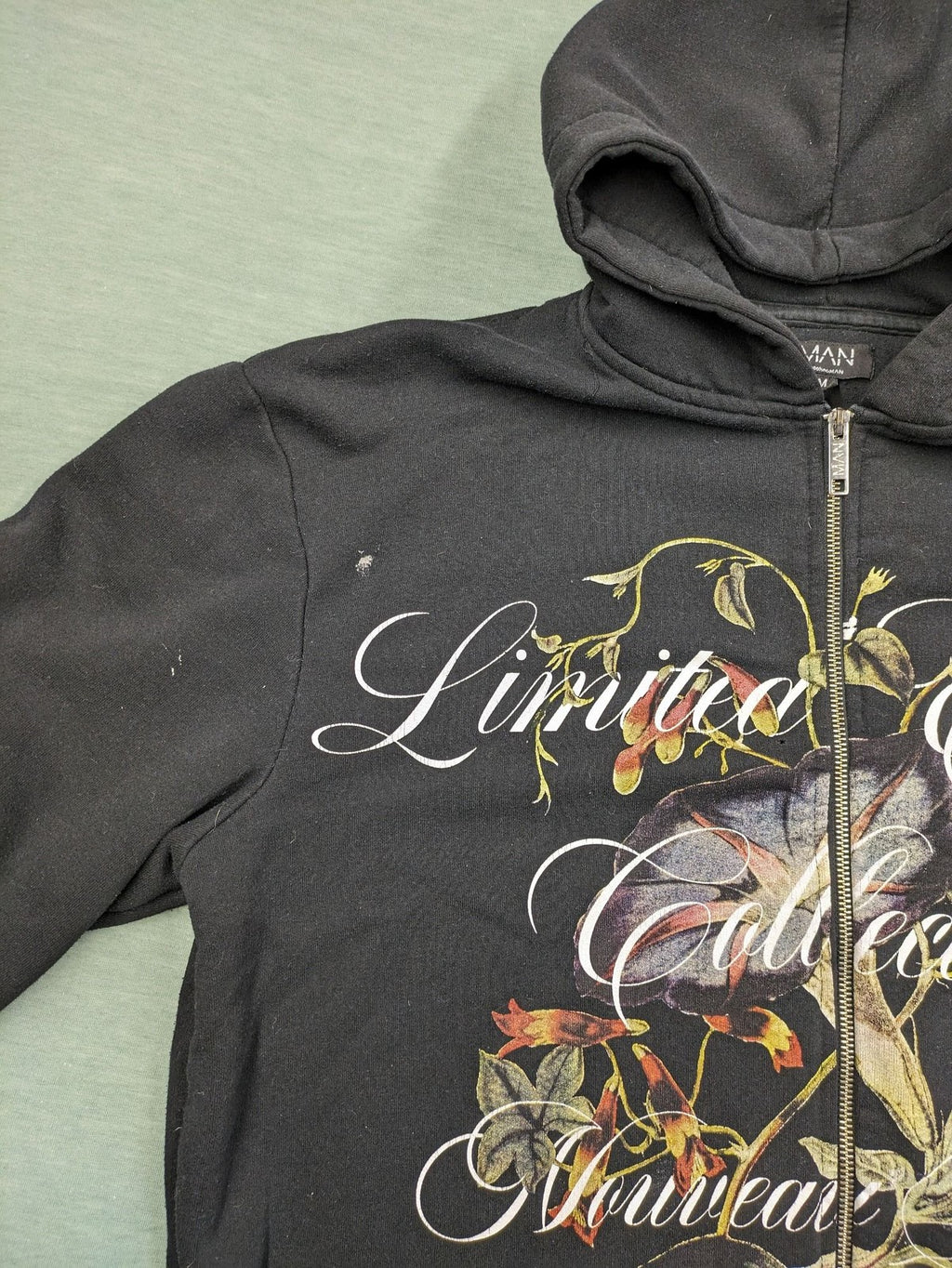Boohooman zip-through hoodie black with floral graphic and "Limited Edition Collection" text.