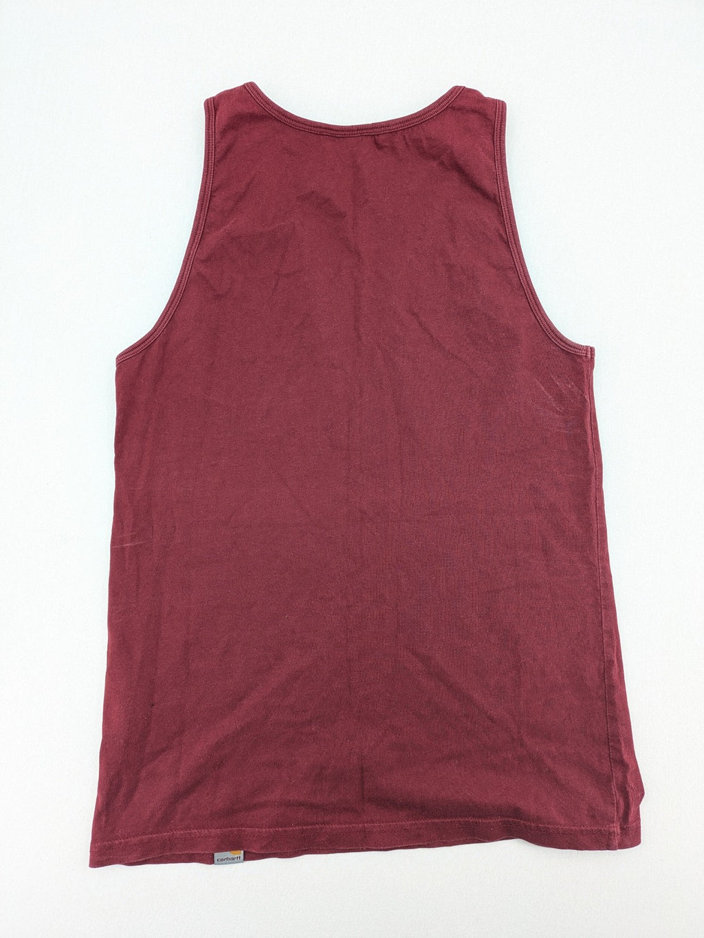 Carhartt burgundy tank top 100% cotton with iconic logo patch at hem.