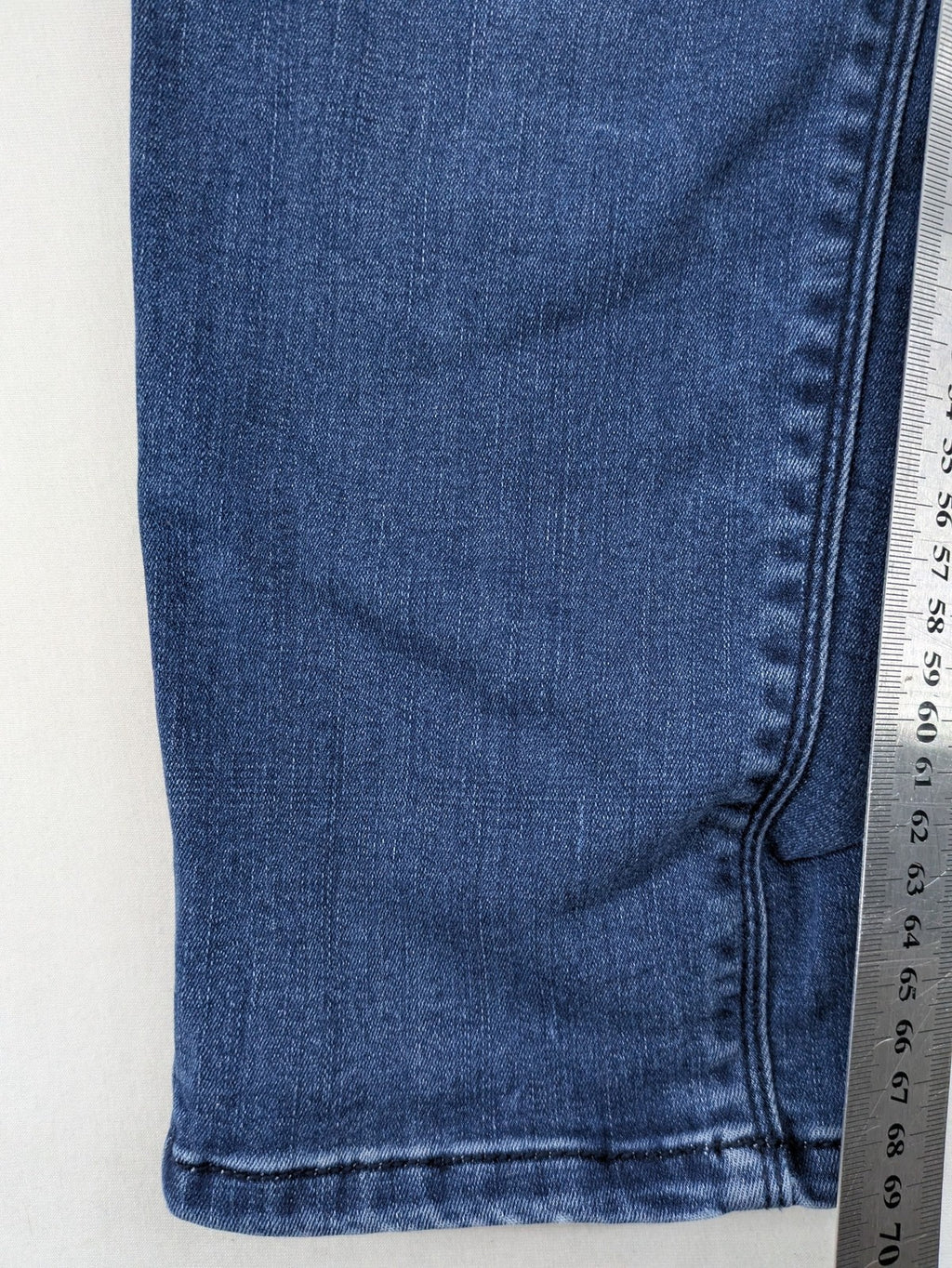 Tom Tailor blue skinny jeans with classic 5-pocket design and double button closure.
