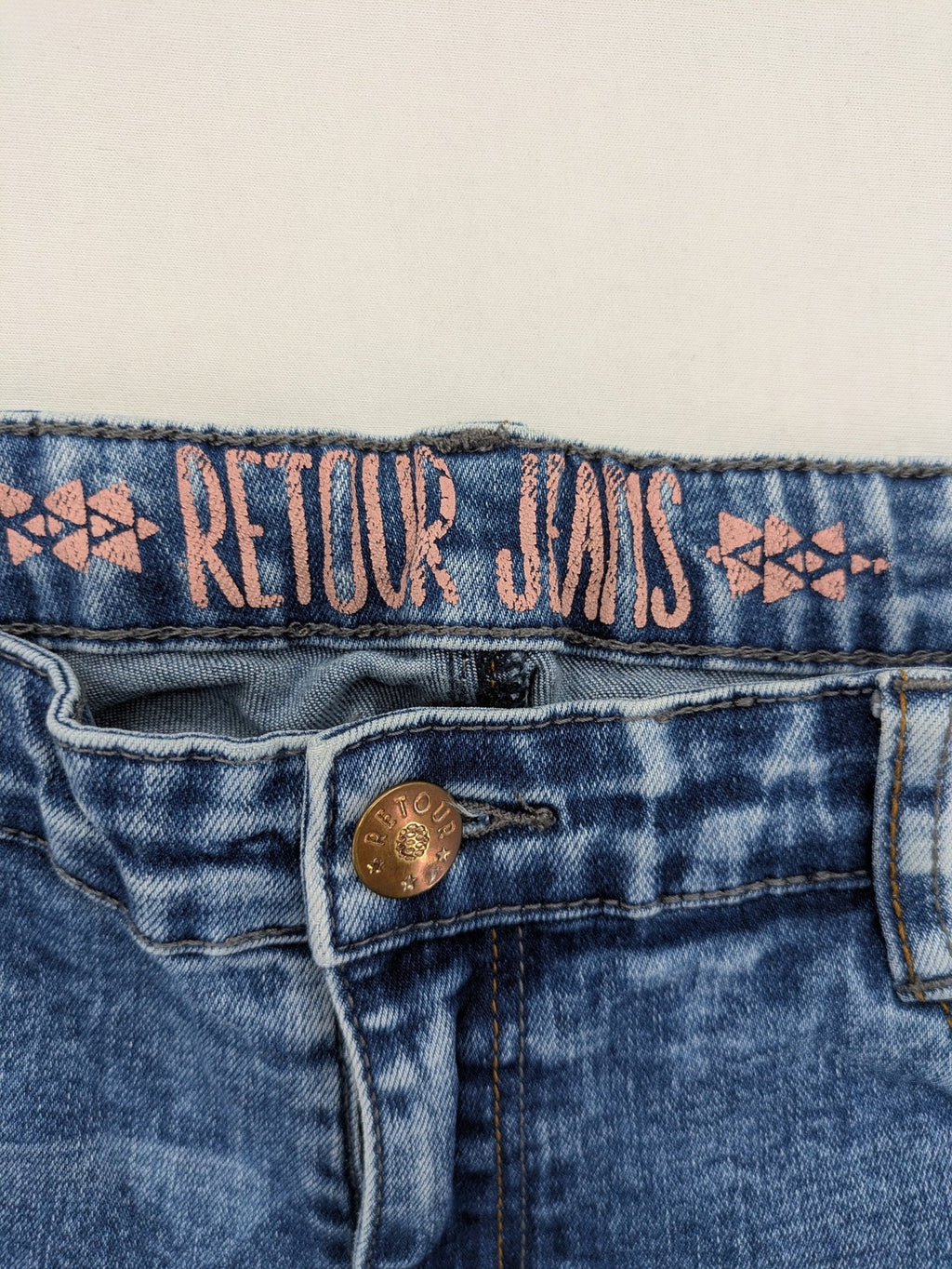 Retour blue slim fit jeans with classic 5-pocket style and adjustable waistband.