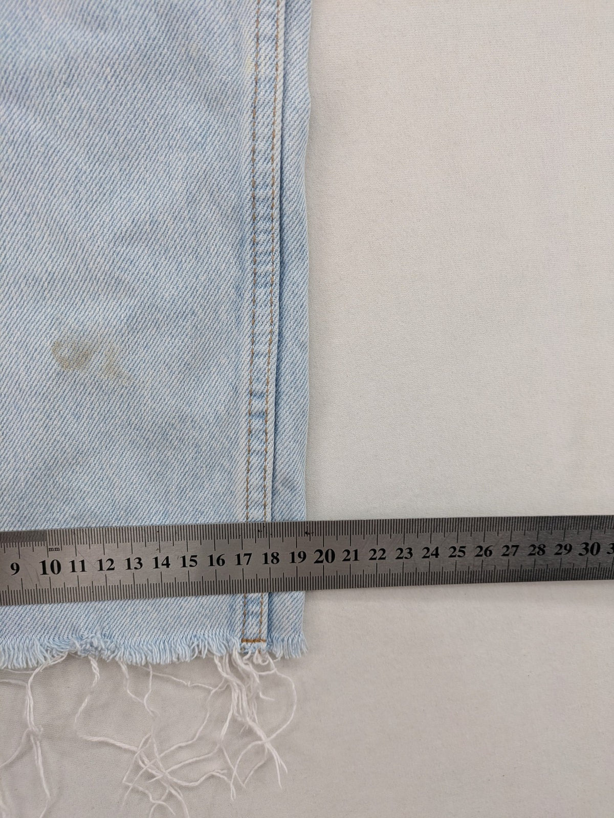 MNG blue high waist mom jeans with raw hem and five-pocket style.