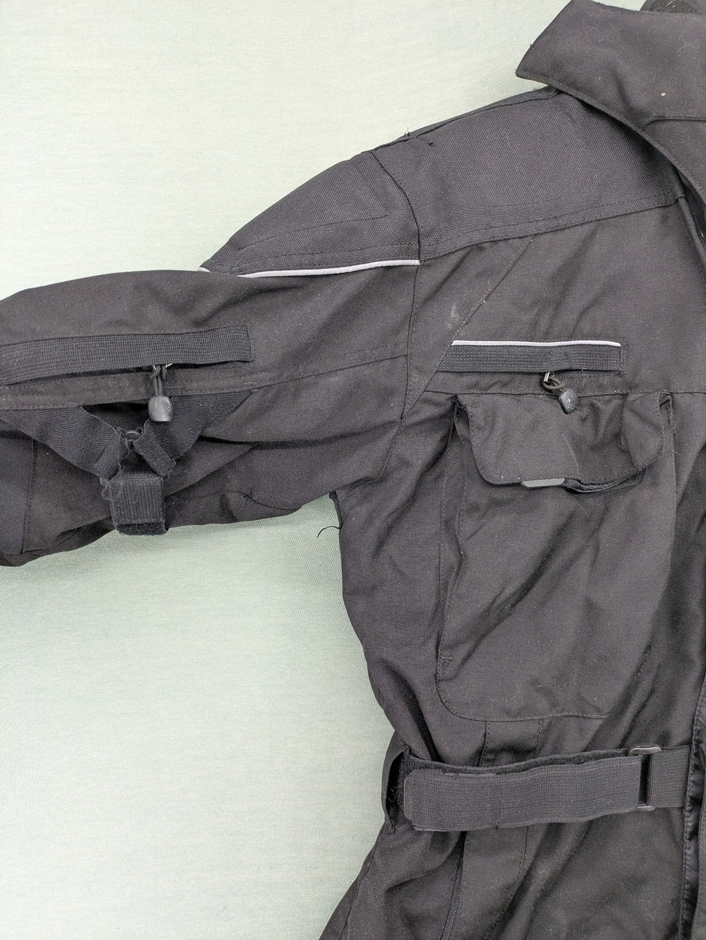 Advanced Experience black motorcycle jacket with Z-Liner membrane and CE protectors, durable Cordura material.