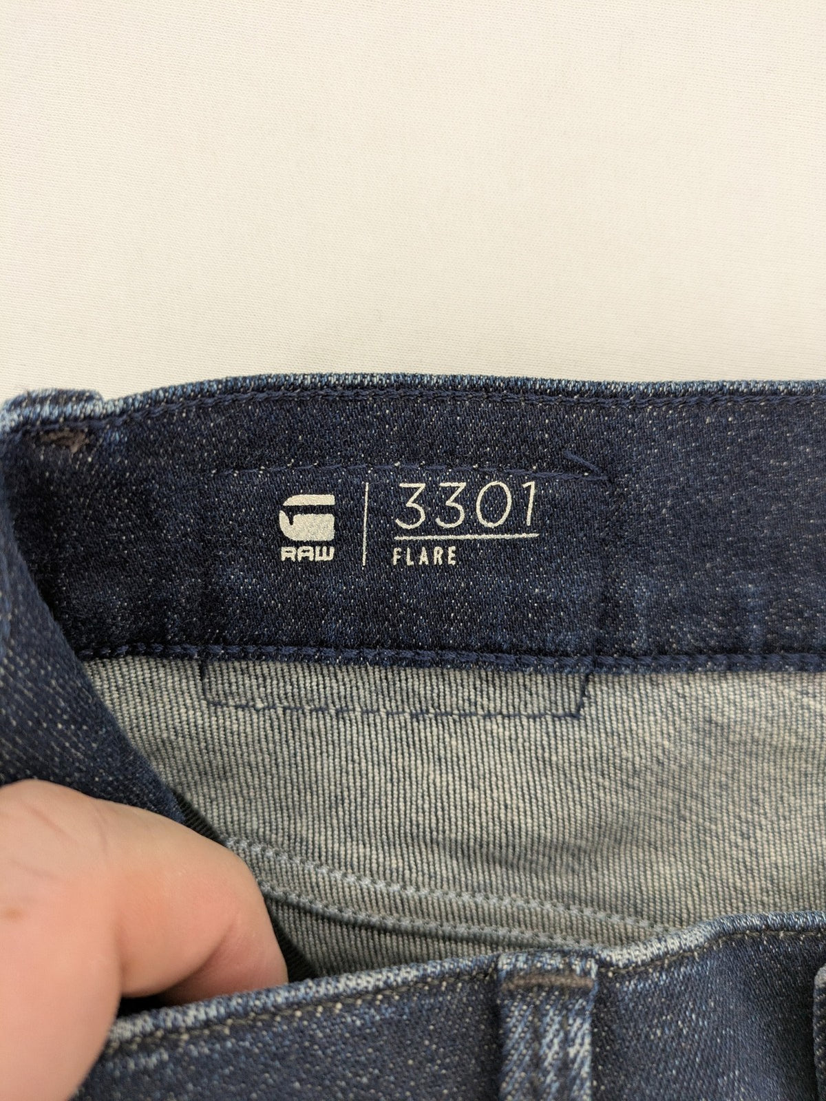 G-Star Raw blue flare jeans with classic 5-pocket design and stretch denim material.