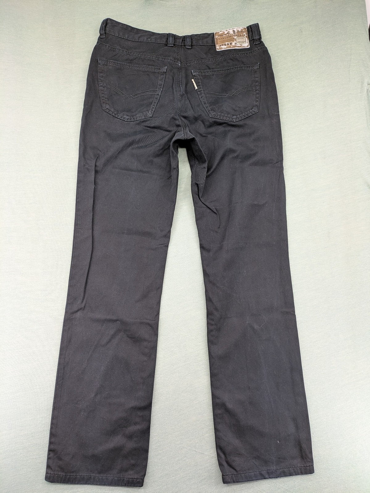 Joker black straight jeans five-pocket design with prominent stitching and brand details.