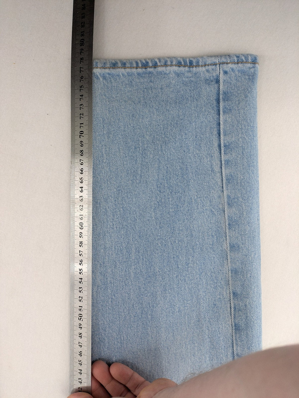 Levi's blue straight jeans light wash denim with button fly and classic fit.