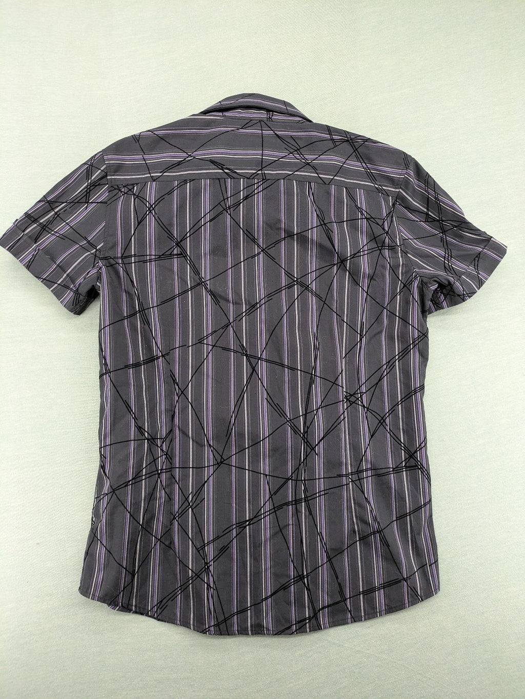 Clockhouse short-sleeve shirt grey purple striped with abstract black graphic pattern and purple collar.