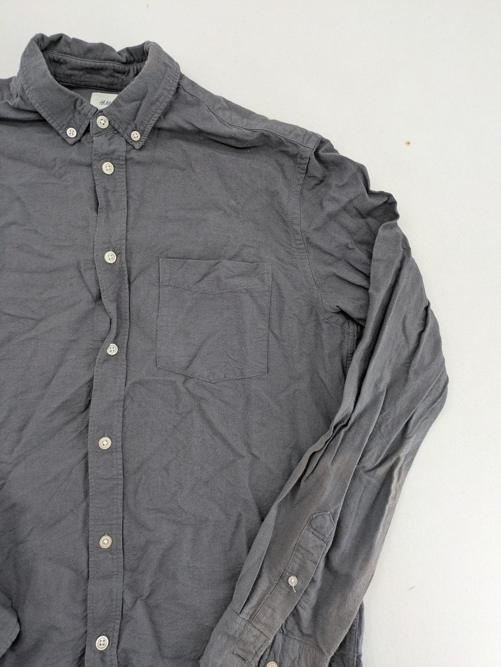 H&M L.O.G.G. grey button-down shirt, regular fit, single chest pocket, cotton material.