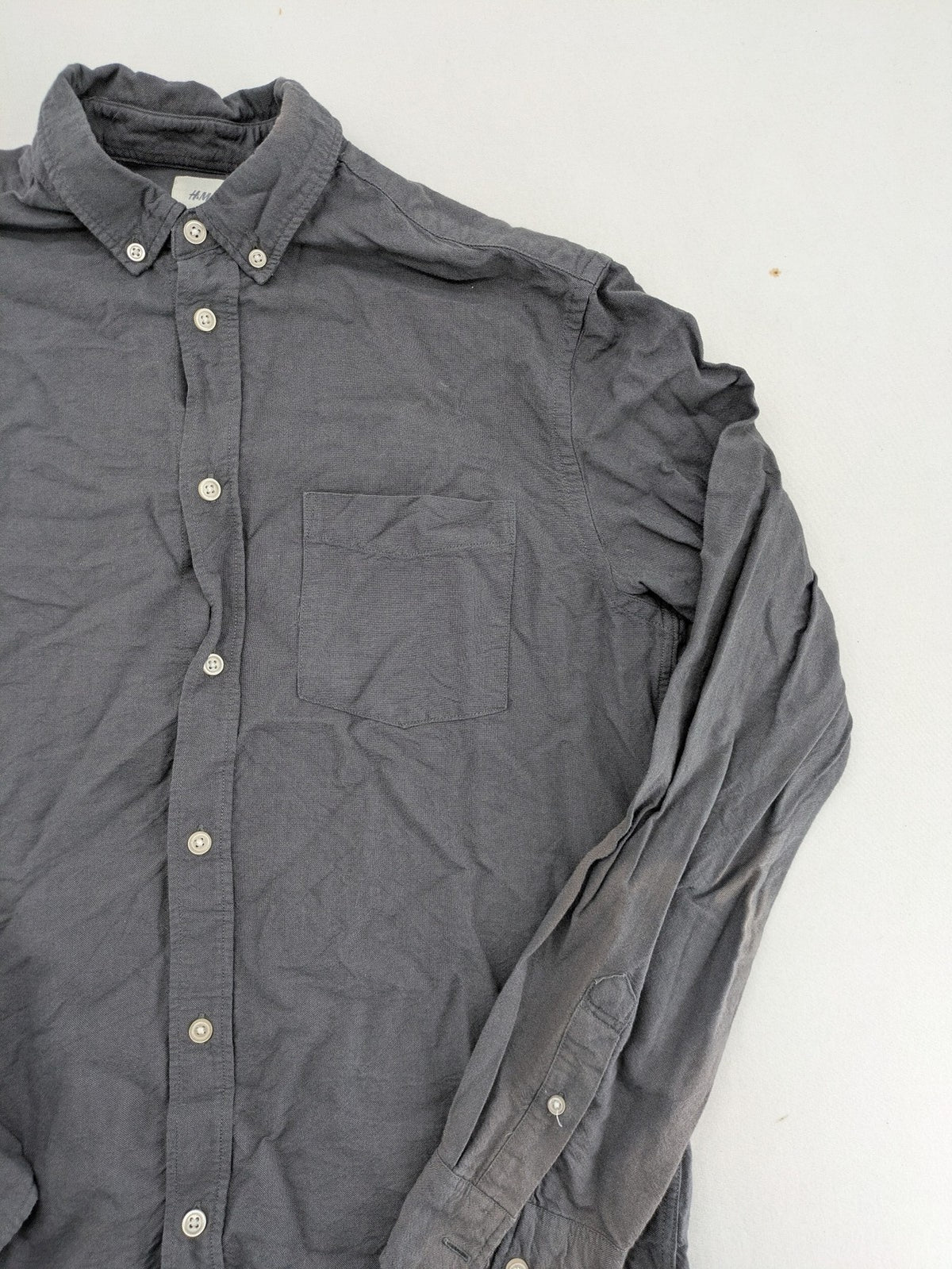 H&M L.O.G.G. grey button-down shirt, regular fit, single chest pocket, cotton material.