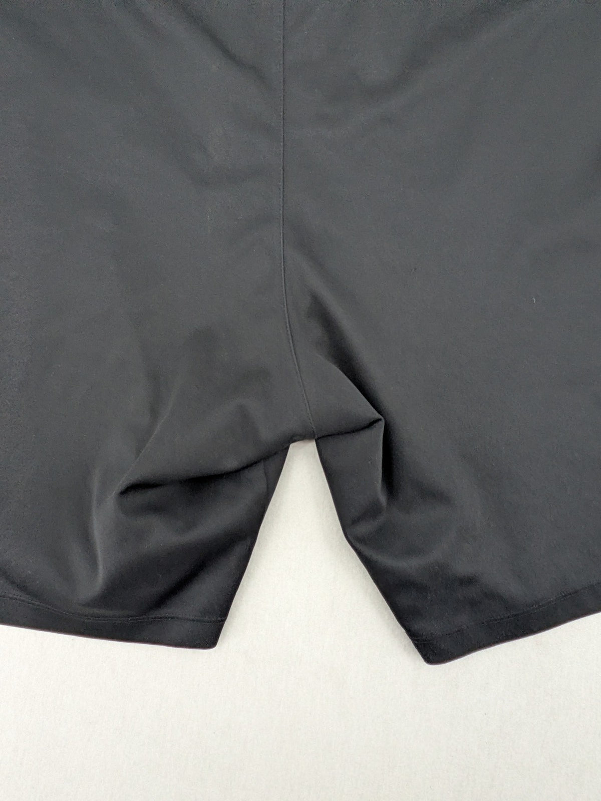 Bayer black training shorts with red side stripes, embroidered team crest and Castore logo.