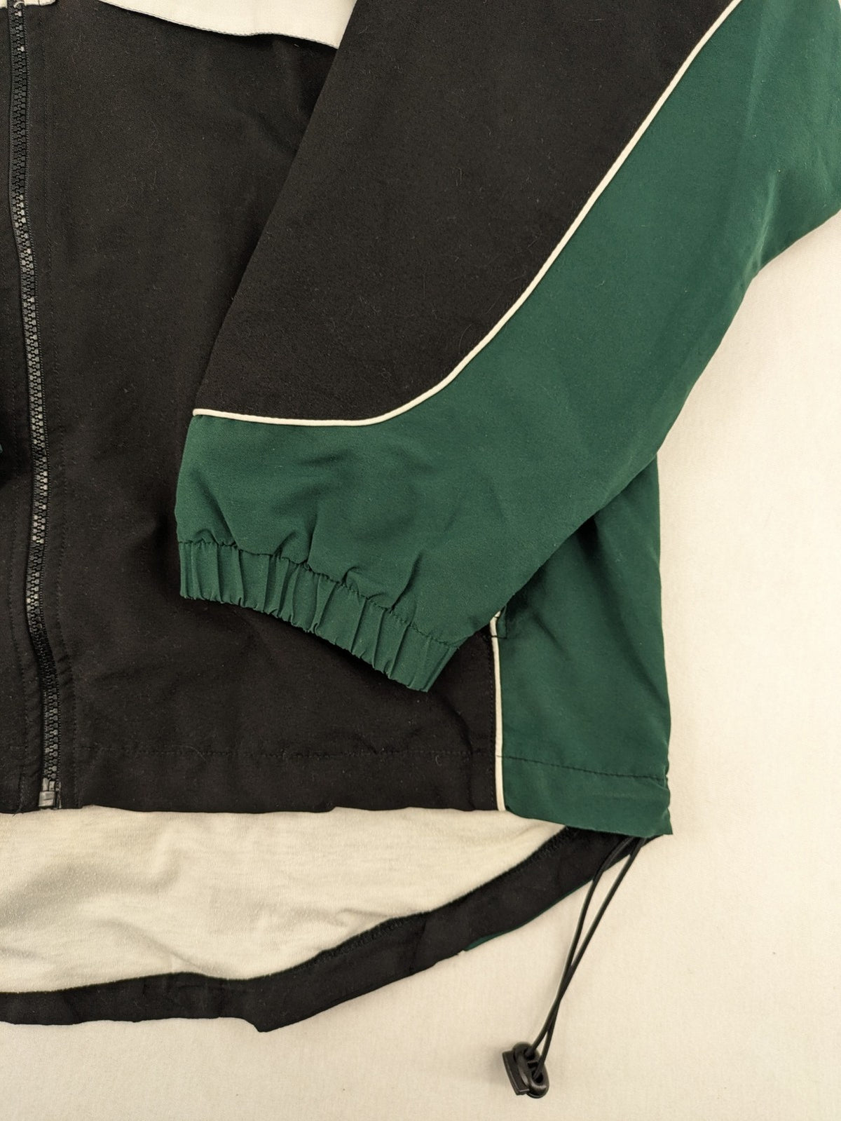 Alex Athletics multi jacket vintage colorblock design with zip, stand collar, and elastic cuffs.