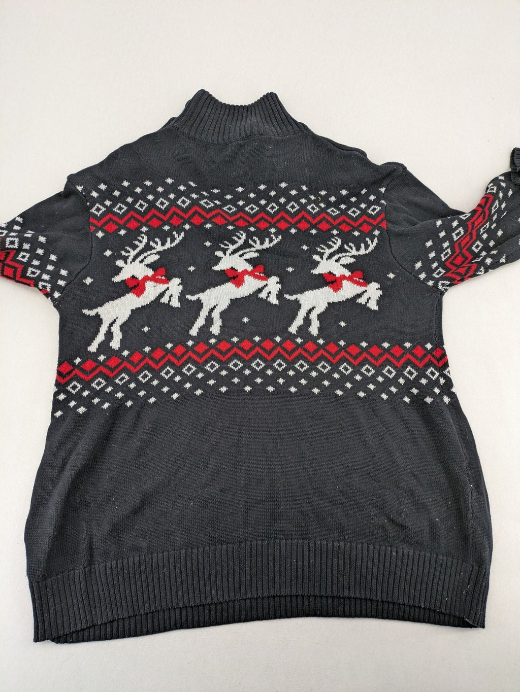 BPC Bonprix grey red white turtle neck jumper with reindeer Fair-Isle pattern and decorative buttons.