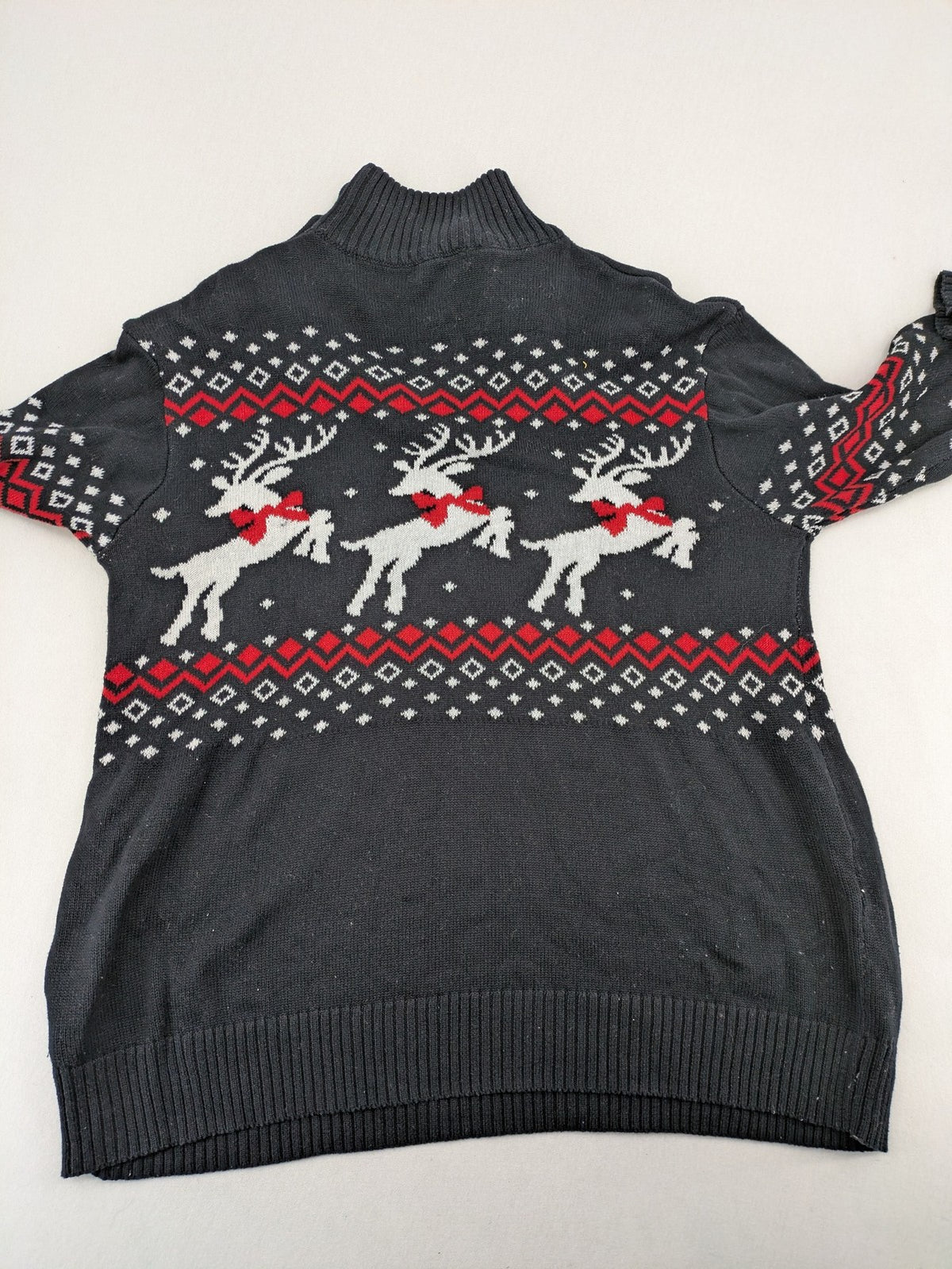 BPC Bonprix grey red white turtle neck jumper with reindeer Fair-Isle pattern and decorative buttons.
