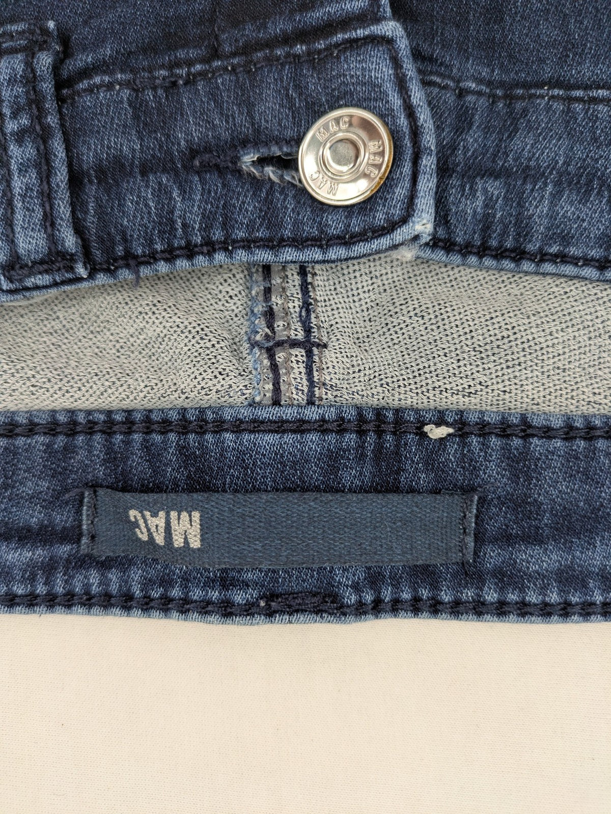 Mac Jeans blue slim fit straight jeans with light wash and stretch material.